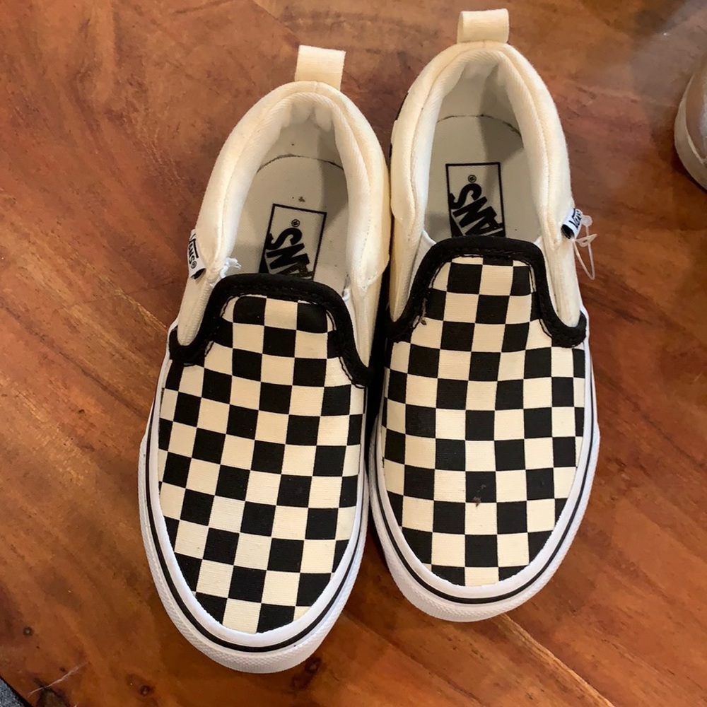 Classic Vans checkerboard slide on sneakers